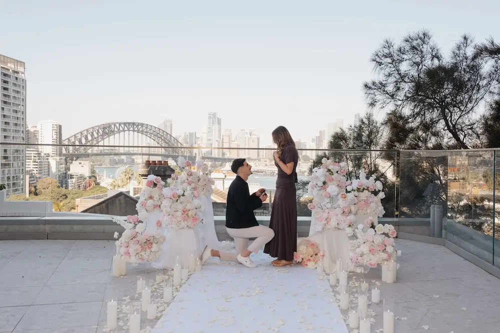 Adrian and Claudia's proposal at view sydney rooftop