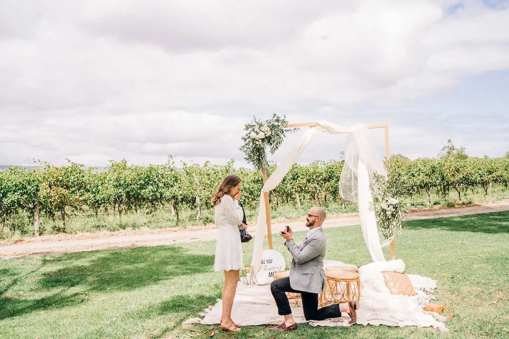 Couple Proposal Moment in Winery