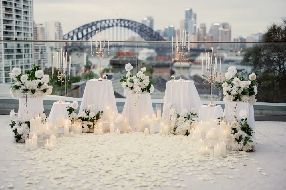 sydney rooftop with white floral arrangement setting