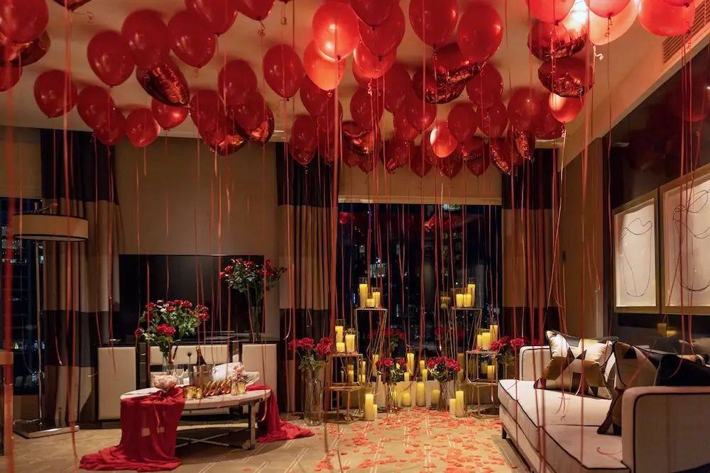 surprise balloon setup in hotel room