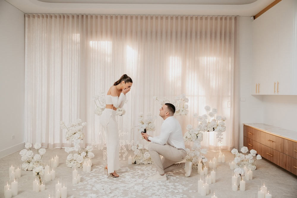 Intimate white proposal setting