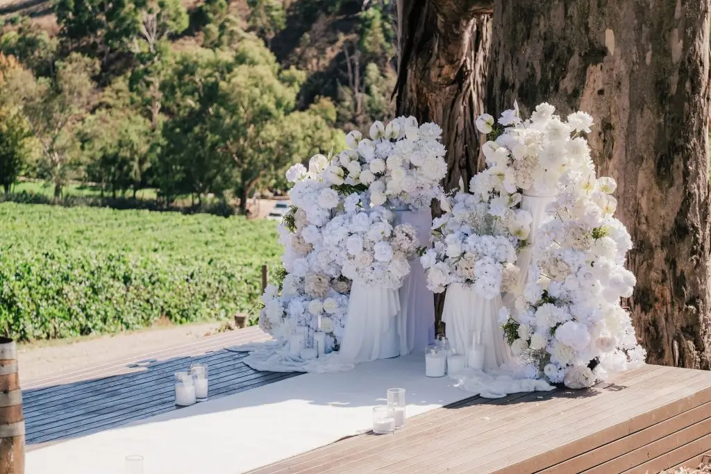 white florals with hydrangeas, lilies, and peonies.