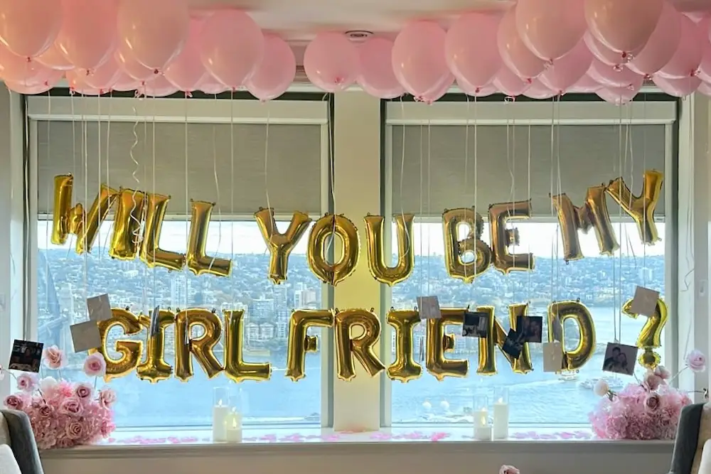 will you be my girlfriend balloons in hotel room