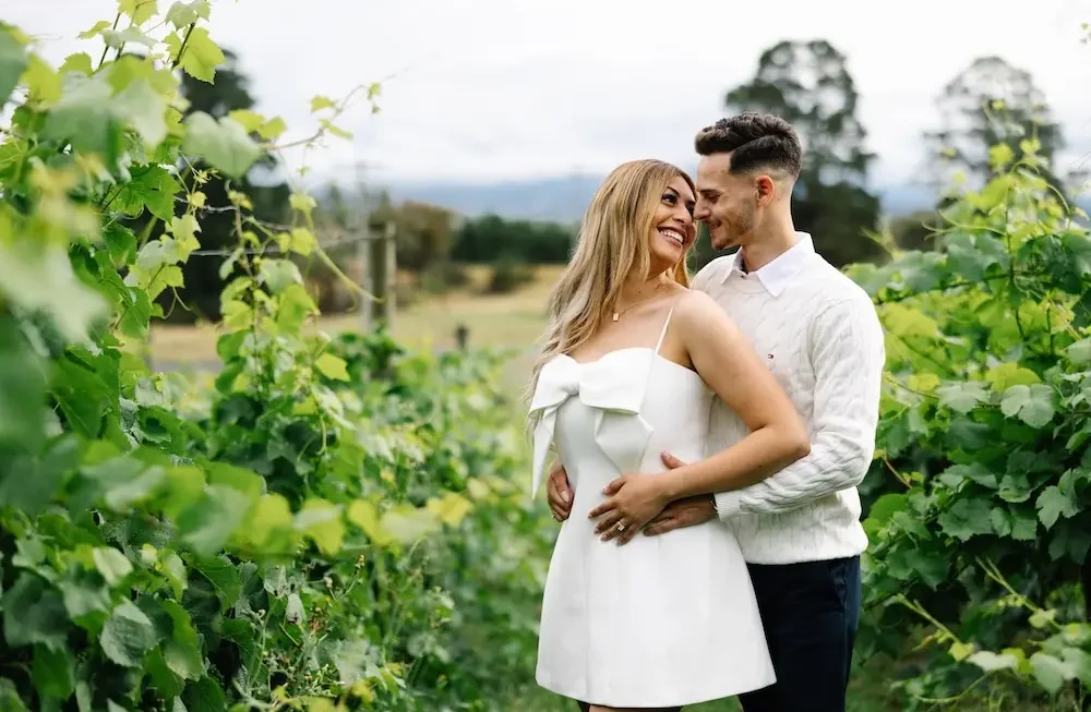 couple in vineyard